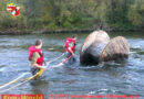 Die Kabelrollen im Fluss
