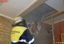 D: Holzboden um einen Kamin qualmte