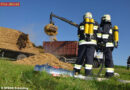 Oö: Strohballen auf Anhänger fangen Feuer