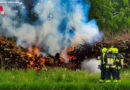 Oö: Fw-Leute bemerken Brand eines Holzhaufens neben Feldkirchner Badesee