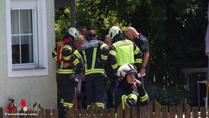 O: Brennender Gasgriller in Holzhausen